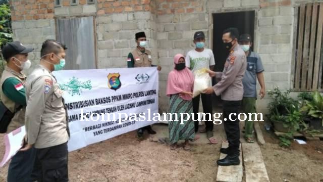 Polres Lamteng Bersama Ormas NU Membantu Masyarakat Terdampak Covid-19